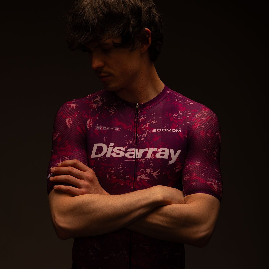 Disarray — studio portrait, arms crossed