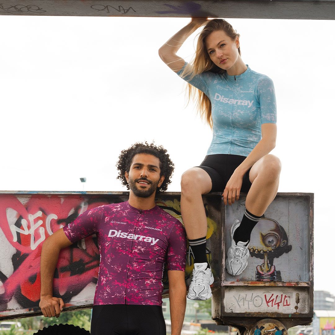 Disarray — riders against a graffiti wall