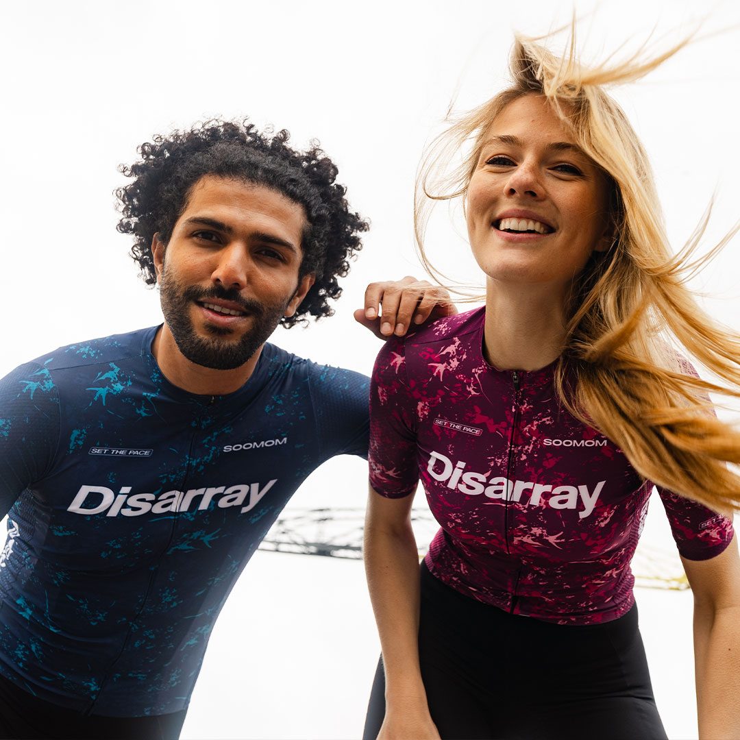 Disarray — two riders laughing on the waterfront
