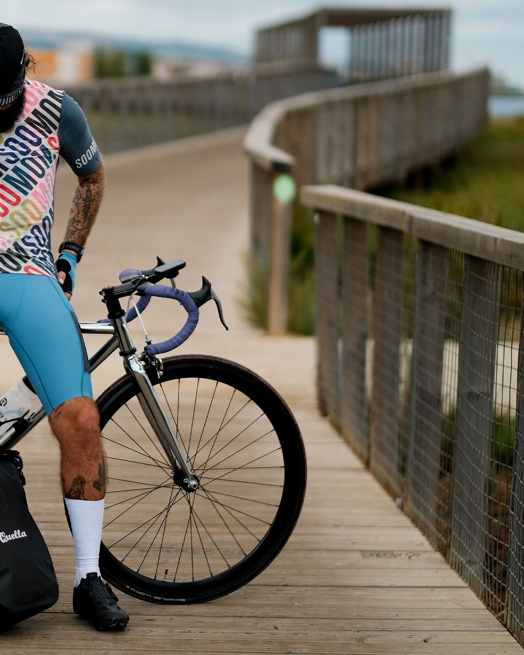 SpinSpin swipe — rider and bike on the boardwalk — slide 2
