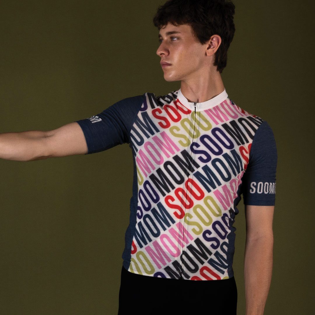 SpinSpin — model in the jersey, arm outstretched